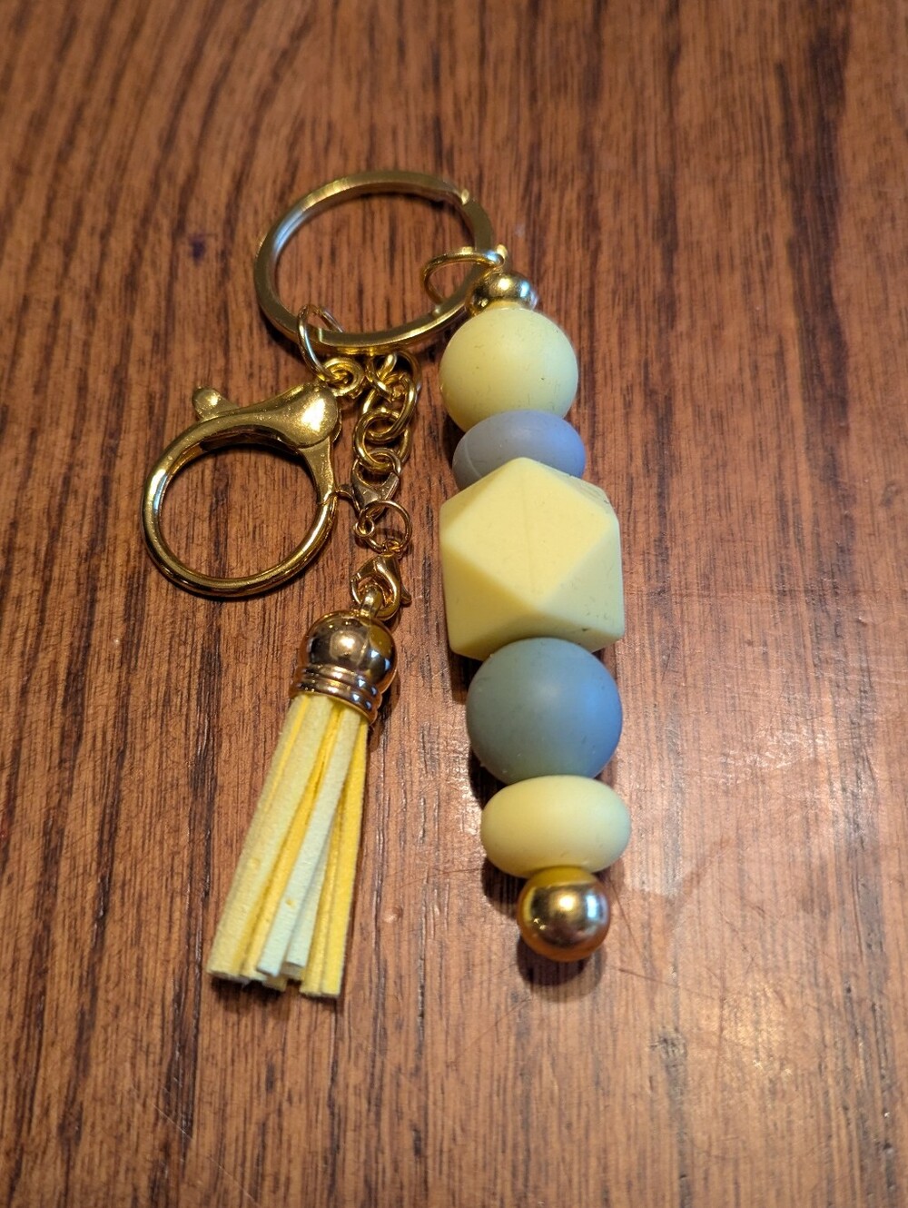 Yellow keyring with silicone beads